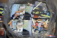北が作った韓国向けビラに「冷麺食う」文大統領の合成写真…たばこの吸い殻も