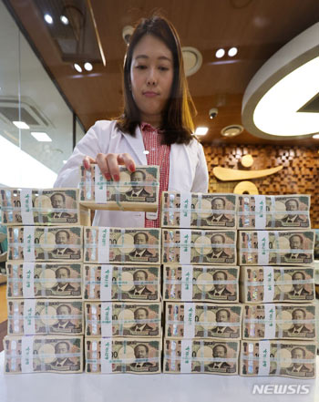 100円＝900ウォン」まで円高が進んだ為替レート-Chosun online