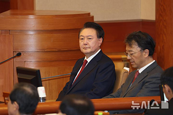 ▲／写真共同取材団