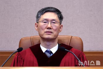 ▲文炯培（ムン・ヒョンベ）憲法裁判所長権限代行。1月23日／NEWSIS