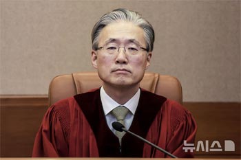 韓国憲法裁、新権限代行に金炯枓裁判官を選出
