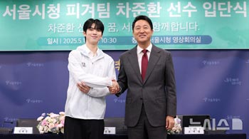 写真＝共同取材