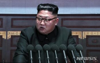 金正恩総書記、13歳バスケ少年時代の写真初公開
