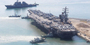▲釜山の作戦基地に入港した米海軍の空母「ロナルド・レーガン」。23日撮影。／キム・ドンファン記者
