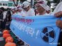 「原発汚染水の海洋放出反対」　行進する済州の海女たち