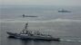 ▲18日、釜山に寄港した米戦略原潜「ケンタッキー」（写真中央）　写真提供：在韓米軍