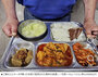 「犬の食事」「なぜご飯の上に」　韓国で無料食事提供の神父に悪質コメント殺到